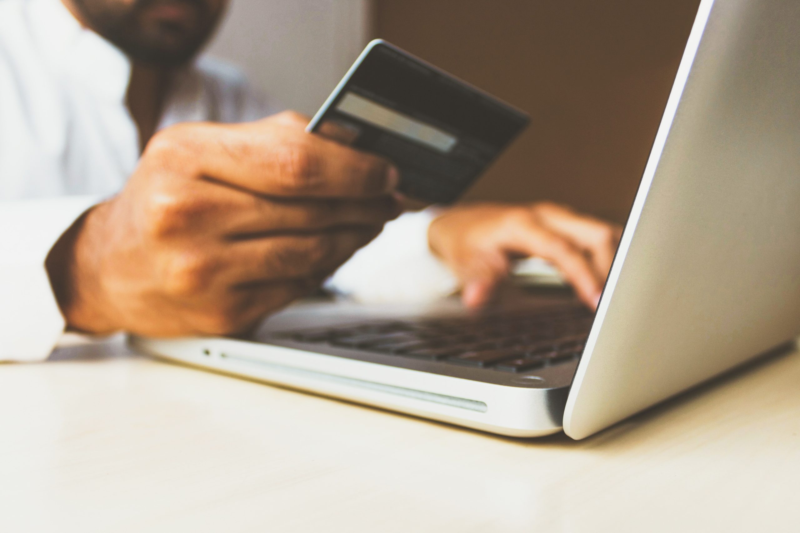 Stock photo of the Business Man with a credit card by rupixen